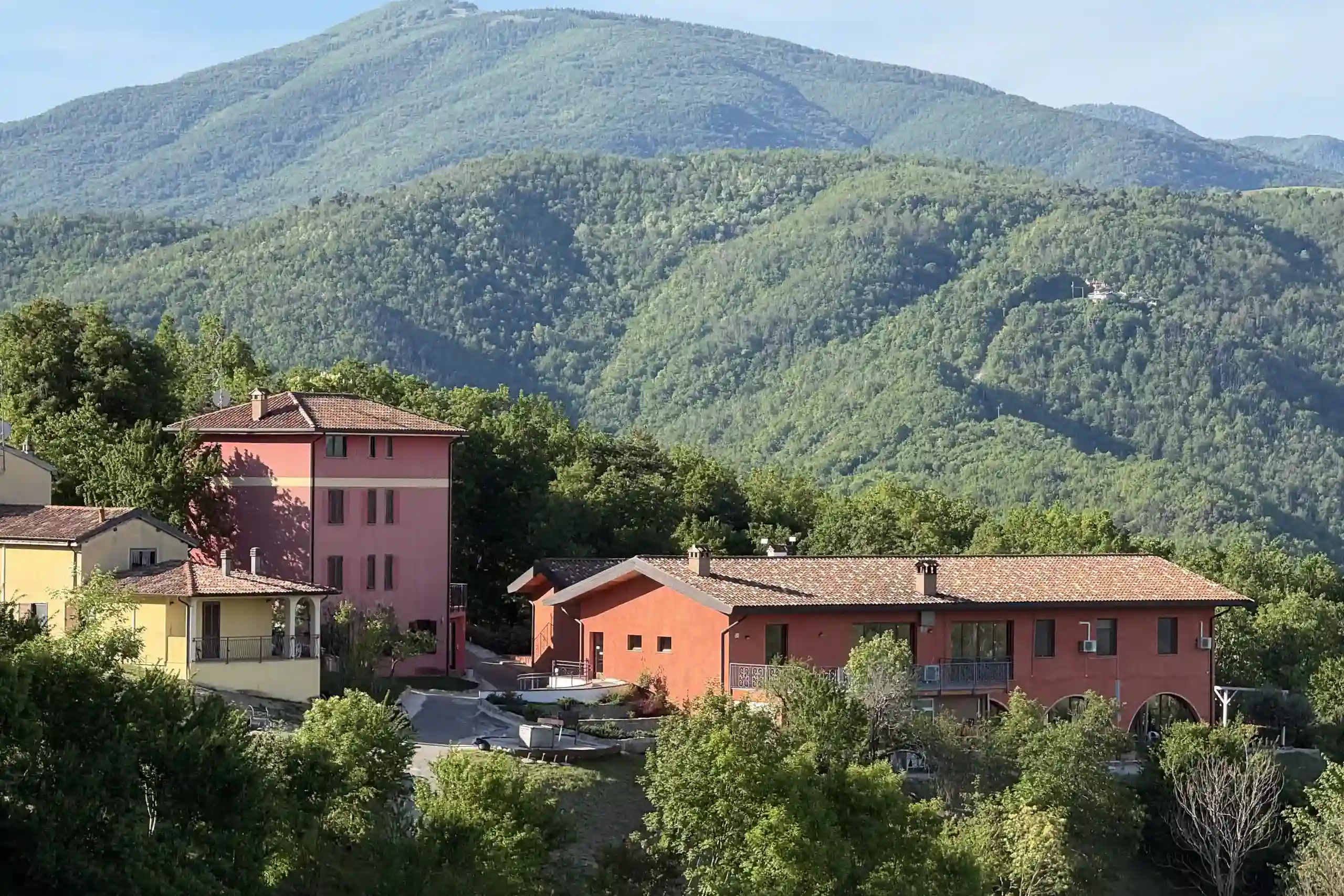 borgo-against-forested-mountain