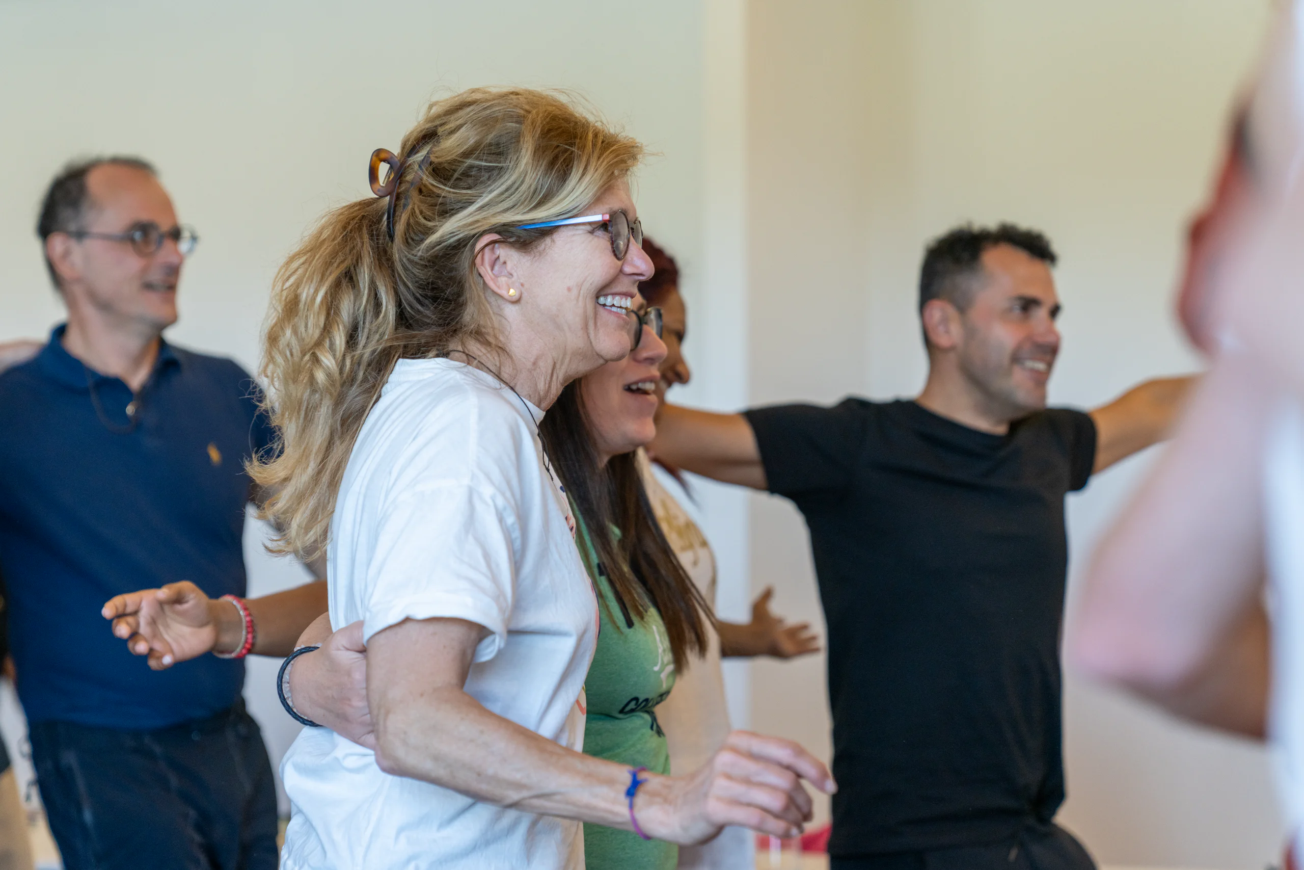 Participants laughing during a group activity